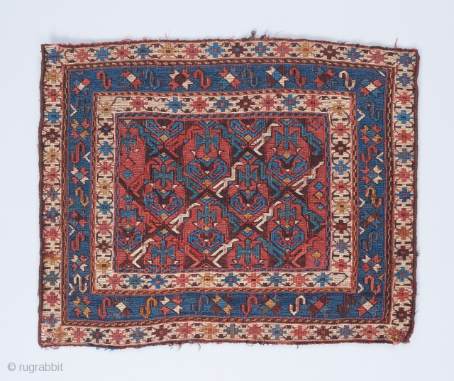 Caucasian soumak bag with great negative/positive space interplay in the field . 1'10" x 1'7".                  