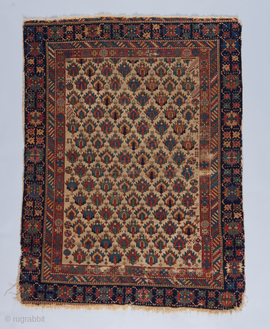 Early east caucasian with flame design. Missing outer border. 4' x 3'1".                     