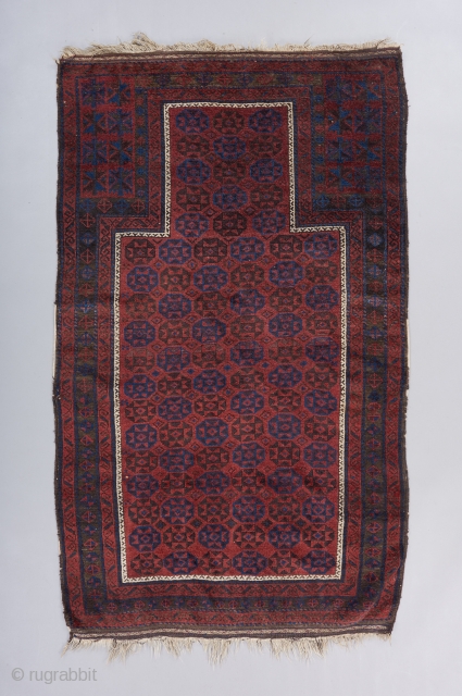 A stately Timuri prayer rug. Great moody color palette, especially the blue. Very good condition. All original. 3'11" x 3'. 

Please visit our website for more collectible Baluch rugs : https://www.bbolour.com/all-tribal-and-village-rugs/baluch-rug-3  