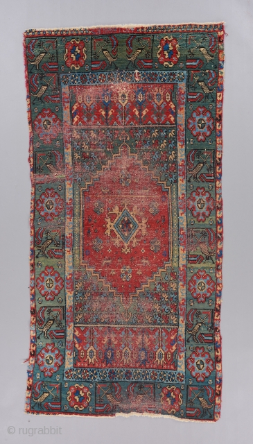 An early Morrocan Rabat rug. Circa 1800. A very rare example of a rare group. While most pieces in this group contain a hodge podge of elements from different traditions, the design  ...