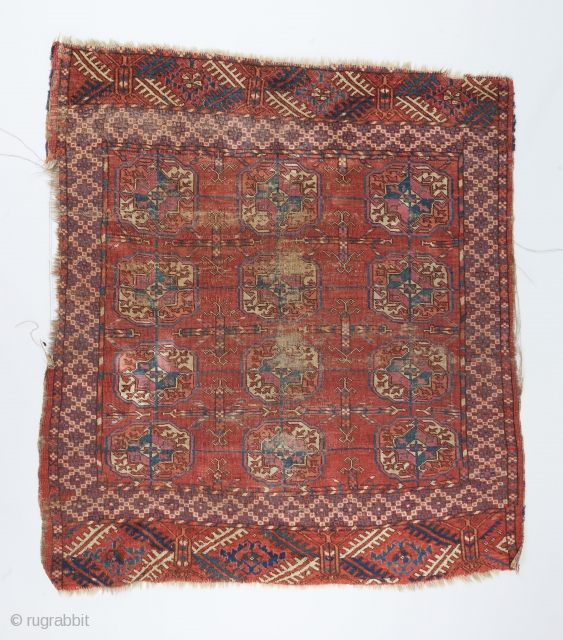 Funky Tekke small rug with an interesting border and elems.  3'8" x 3'3" .

Please visit our website for more rare woven art : www.bbolour.com        