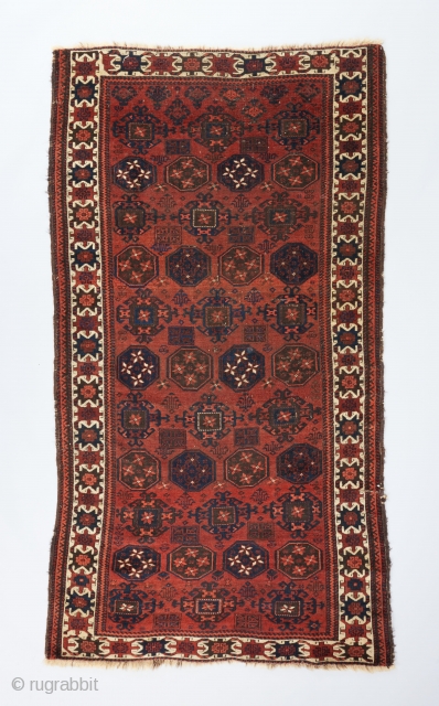 Fine Baluch rug with Kurbaghe gols and an interesting white ground border. 5'4" x 2'11".

Please visit our website for more collectible woven art : www.bbolour.com        