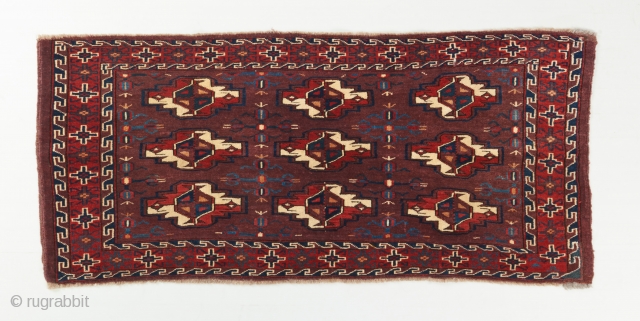 A lovely yomut torba in very good condition. Recently acquired. Great color and rare secondary gols. Mid 19th century. 3'8" x 1'8".

Please visit our website for more rare woven art : www.bbolour.com 