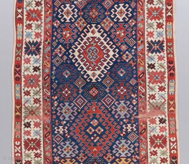 Kazak long rug with dazzling colors. 11'7" x 3'10"                        
