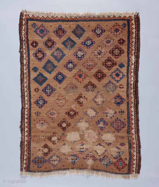 Camel ground Baluch. 3'6" x 2'8". has some fuchsine, some old repair, and wear as visible. Very cool and unusual piece. Email noah@bbolour.com.          