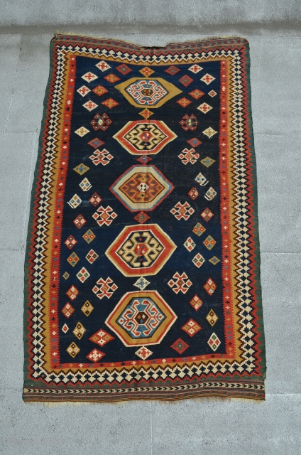 Qashqai Kilim. 8'4" x 5'. The white is in cotton.  Almost all original except for a few scattered, small repairs.            