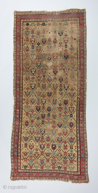 An early 19th century Caucasian rug. Elegantly executed field design with a gorgeous color palette. Nice pile at the bottom and heavily worn at the top as can be seen. A couple  ...