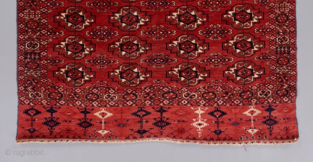 Super quality Tekke wedding rug in great condition. Fine weave and brilliant color. A very well articulated field, border and elem panel design. Near perfect condition with velvety medium pile all around.  ...