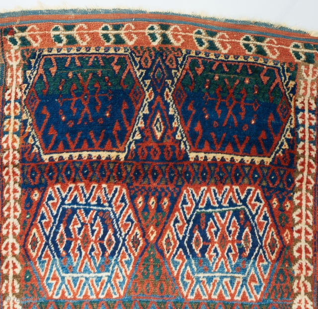 East Anatolian Kurdish rug. All original. Mostly high pile with one area worn to the foundation as visible. Fiery orange and electric blue. Great wool. An authentic village weaving. 6'4" x 3'7".  ...