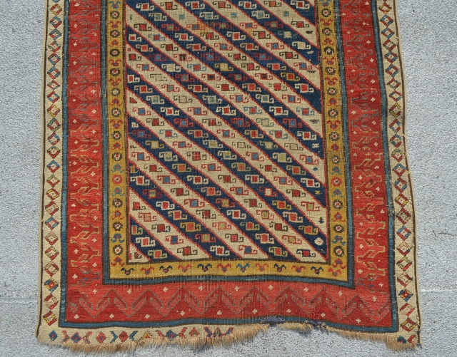 Genje. Mid 19th century or older. All original except for two small repairs on the border and sides are redone.

7'3" x 2'10"           