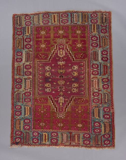 Kirshehir rug. Earlier than most. A rare, classically derived double niche design for this type, with a Ghiordes type border. Beautiful color harmony. Good condition. 5'7"x 4'1".

Please visit our website for many  ...