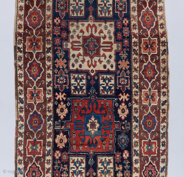 A beautiful Shahsavan runner with great age. 12'4". x 3''6". A dog stain towards the lower right and some heavier wear towards the bottom. Mostly in great pile.     