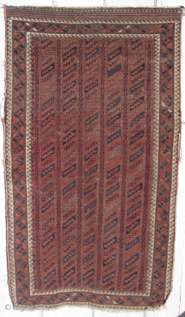 An unusually designed Baluch carpet from the late 19th century. It has some minor selvage damage, and a little low in pile in some areas. It measures out to 2ft 10in x  ...