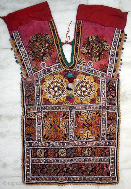 Old/Antique Kutch Choli. This is an exquisite old choli front from the Kutch India, probably made and used by a bride in her wedding. The choli is 30 inches from top to  ...