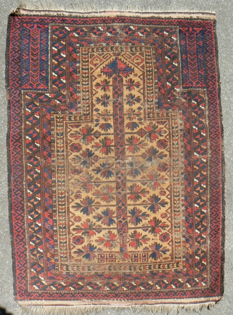 Antique Baluch Prayer Rug. 31 x 45 inches. 19th Century. See Michael Craycraft's "Belouch Prayer Rugs," plate 24 page 58 for a similar example. Low even pile and wear. See more textiles  ...