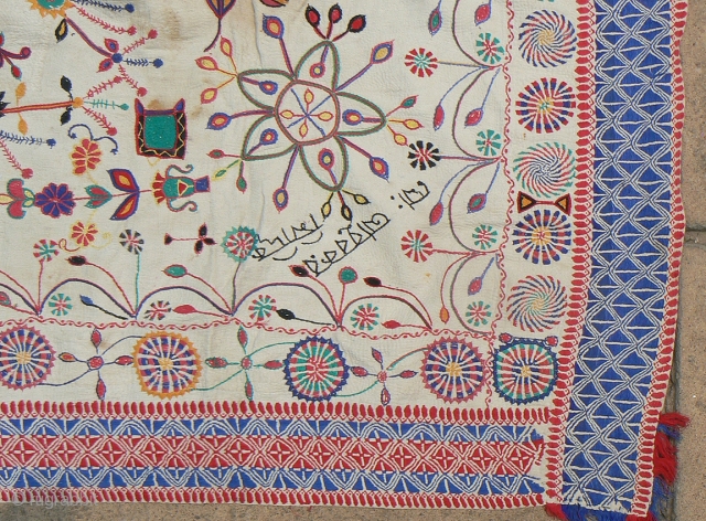 Antique Indian Kantha Embroidery Quilt. From the West Bengal region of India. 59 x 39 inches. Wonderful, kinetic design in good condition. Pinwheels, flowers, cannon, Bengali inscription (unknown translation). Nice, colorful running  ...