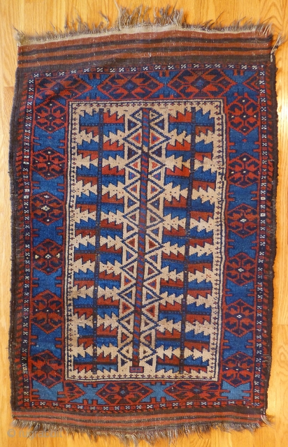 Antique Baluch Rug. 42 x 28 inches. Very good condition. Very nice popping electric blue dye. Great visual appeal. See this rug and lots of others just added at www.banjaratextiles.com   