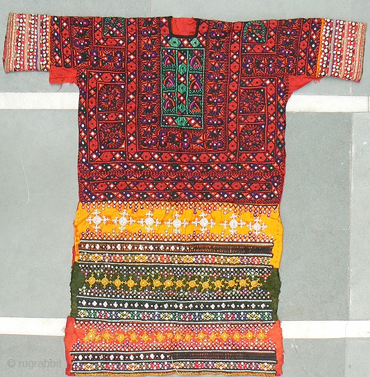 Superb Old Sind Wedding Choli. Beautiful heavily embroidered dress or choli from the Sind region, probably made and used by a bride in her wedding. Fully embroidered on the entire front, making  ...