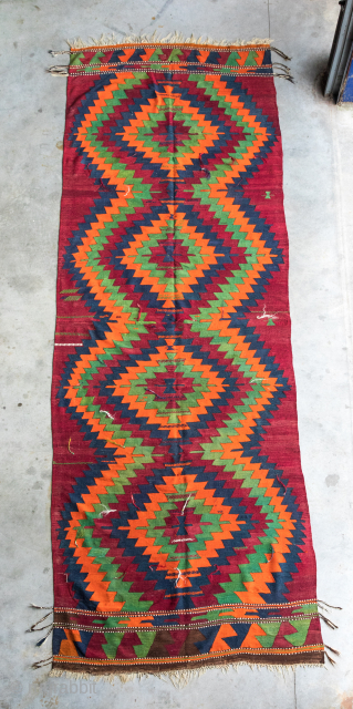 An interesting kilim from Ihlara village , Aksaray area . 
Over 100 years and good colors . 

Size: 430/150 cm             