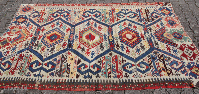 Aydin Kelim around 1900 Wool on Woll, beautiful naturally vibrant colors signs of age
anduse generally in good condition.

Size: 255x160cm

Price: 900€             