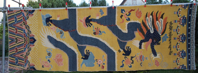 An antique chinese carpet Ningxia (Ninghsia) Region (Western China).
A so called "pollar carpet", featuring a dragon motif set against a golden yellow background.
In the grand halls and monasteries of Western China and  ...