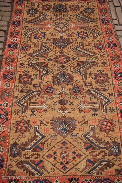 Unusual small camel ground rug, probaly Kurdish, with human figures and lots of animals, natural exceptional colours with a rare light green, good condition, sides secured, handwashed
73 x 130cm    