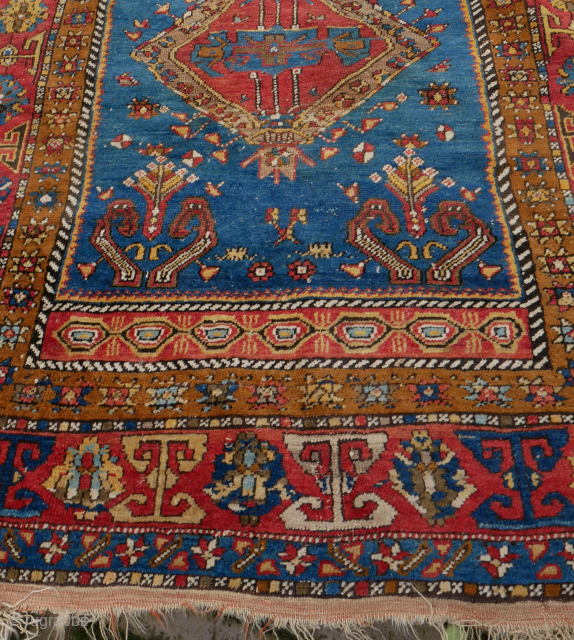 Yahyali small rug, Anatolia, beautiful colors, with royal blue, what's not to like? Good condition, some corrosion, a strong rug. 111 x 140 cm. please use contactform on www.beamol.nl    