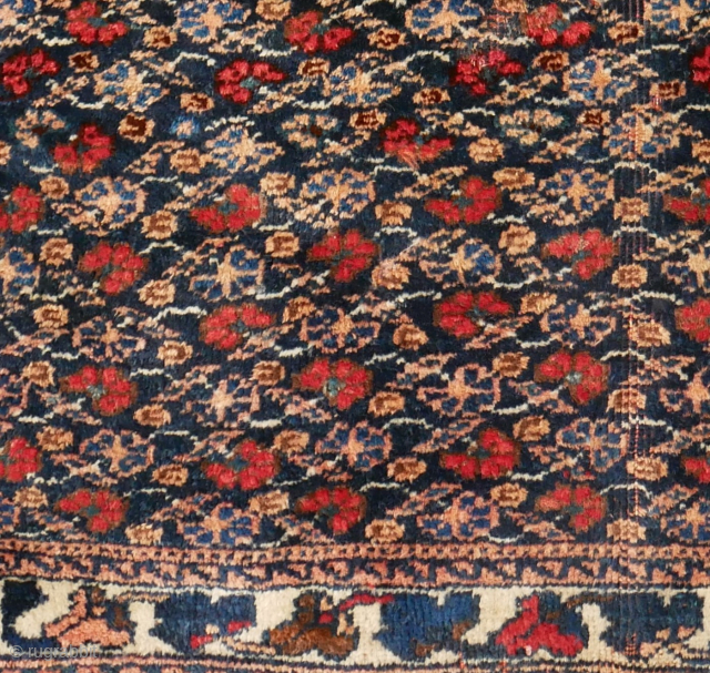 Afshar poshti? small rug, floral design, 75 x 75 cm. not quite square and some moths, signs of use, and the orange has softened, although the colours look good to me. Please  ...