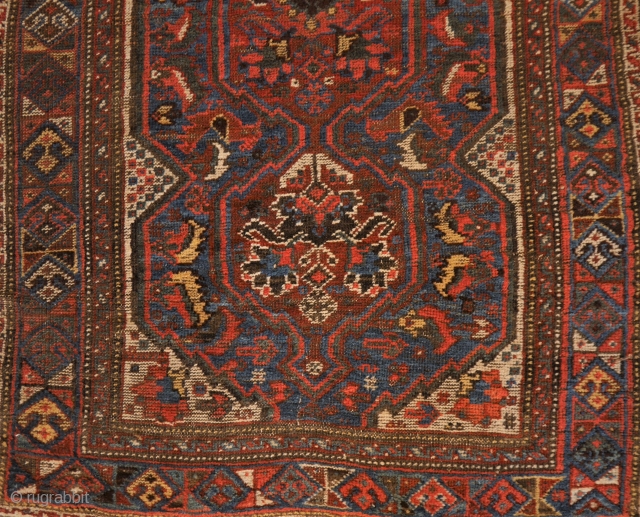 Khamseh rug with phantastic natural colours, in used condition, but very charming,
with fishes and a few birds, 90 x 138 cm.            