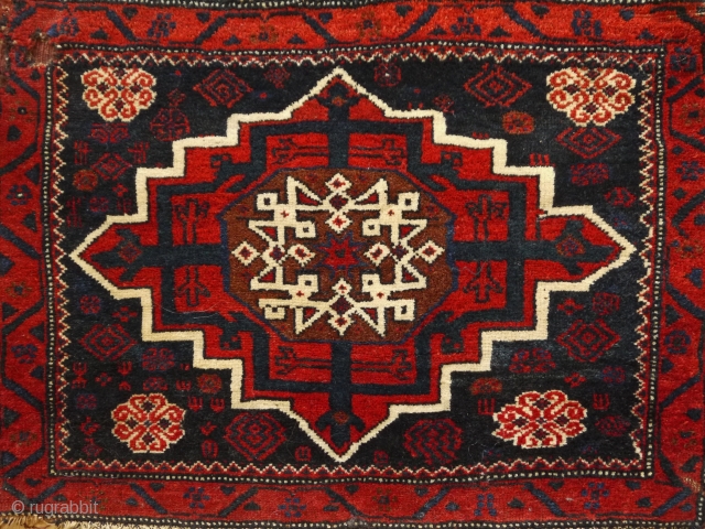 Star medallion bagface, Kirman area, Afshar Baluch.  
Beautiful deep warm colours, condition is good, but there is one 'restauration' at the left side.
81 x 57 cm.      