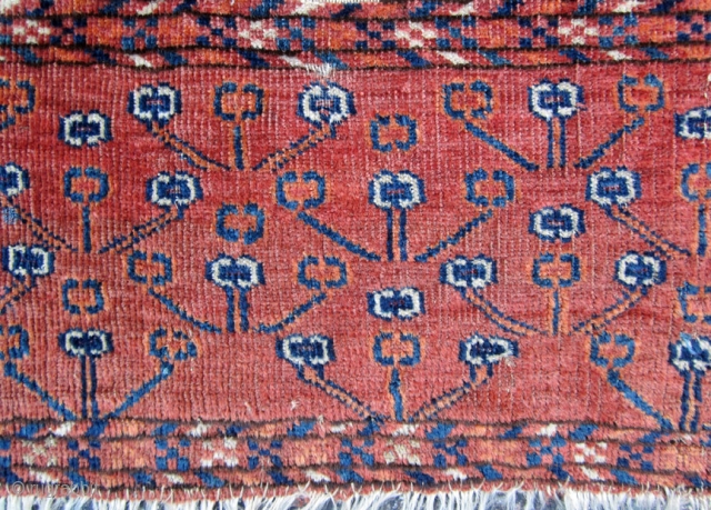 Very unusual Turkmen fragment. probably the skirt from a Tekke Engsi. The centers of most of the elements are magenta silk. One of a kind.        