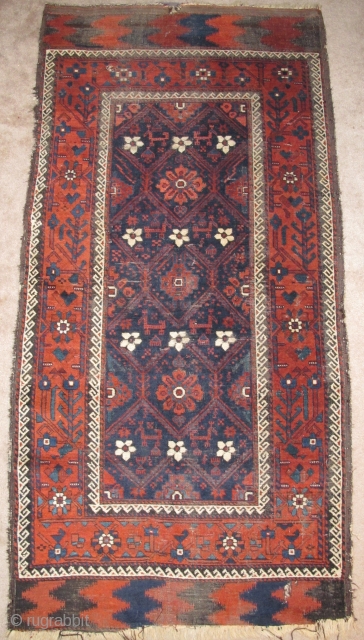 Minakhani Baluch Rug, Depressed warp Khorossan type. Very finely drawn with vivid color and finer than most of this genre. The skirts of this piece are executed in pile rather than kilim.  ...