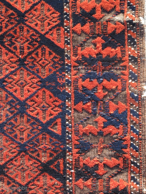 Fine Antique Baluch Rug, Great scale and drawing with several dark blues and practically sculptural corrosion to the browns. Khorosan variety an all-over repeat field derived from flatweaves and a boldly drawn  ...