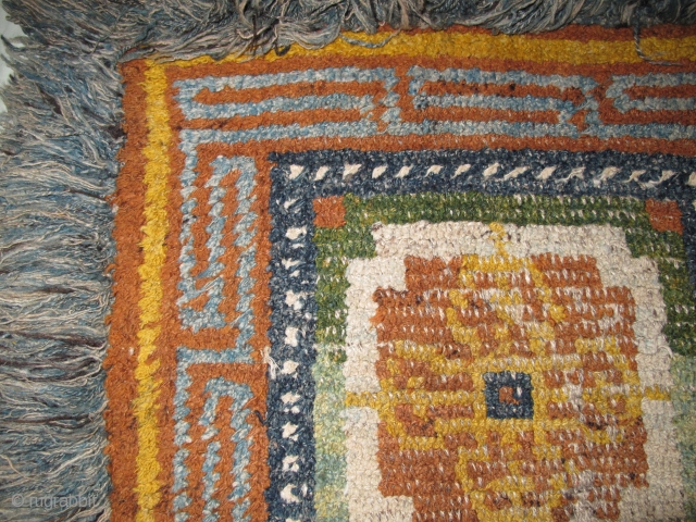 19th cen. Tibetan ' Wangden ' 'warp-back' square with Dorje Tantric thunderbolts making a quatrafoil in the center. Two greens. The pile portion measures about 27"x28". All good natural colors. Center is  ...