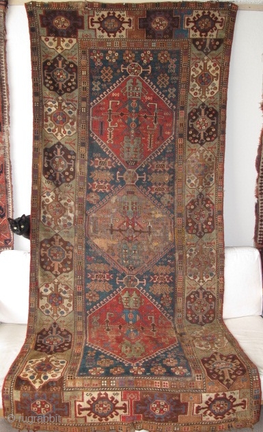 East Anatolian Rug with Transylvanian Border. Great graphics, 3 medallions nicely drawn with an assortment of scorpions. Good colors with an unusual subdued palette. Condition is fair with scattered old "repair" and  ...