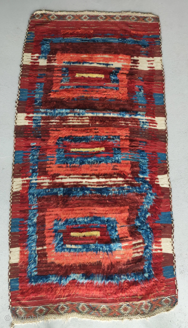 East Anatolian Kurd long pile fluffy rug on a striped kilim. Not sure what these are called but this is a good old one. About 110x220cm       