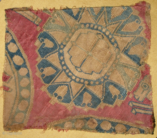 Small Sogdian Silk Samite Twill Textile Fragment. circa 8th century, secondary device with traces of two pearl-border roundels. good color preservation. apx.7"x8".           