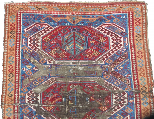 East Anatolian Kurdish long rug with a Caucasian Lenkoran design.  Vibrant color,  exceptional wool, worn. 3 different main border types.           