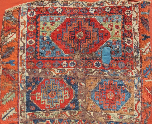 East Anatolian Kurdish Rug with  Memling Guls. Probably 18th century with a rich, diverse and moody color palette, exceptional wool and dramatic drawing. Worn and fragmented but gorgeous, mounted and conserved.  ...