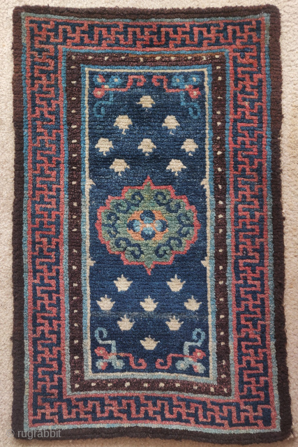 Small antique Tibetan rug, all natural colors                          