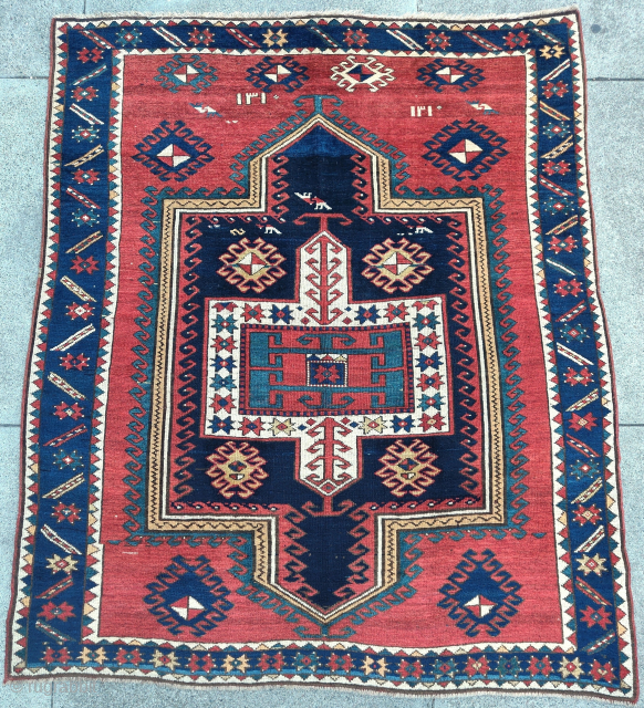 Fakhralo Kazak rug with Sevan influences. Dated 1310 (1892). All good colors, lustrous wool, nice handle. 4'6"X5:7"                