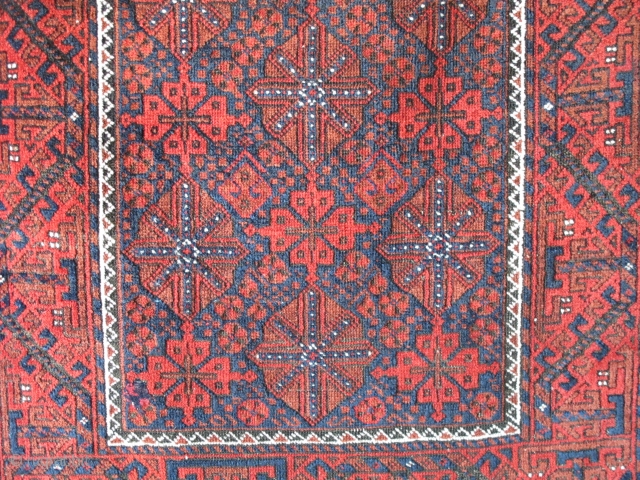 Luscious Arab Baluch Rug with Floating Chemches. Saturated soft wool with all natural colors. Good color shift from vibrant madder red to rust-orange at the top third. Slightly sculptural affect. Asymmetrically knotted  ...