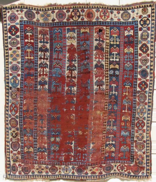 Blitzed but very Beautiful and unusual old South Persian tribal rug. Great colors, graphics and soft lustrous wool. Condition is... ummm... un-restored. (2.12 x 1.79 meters) (This enigmatic piece was published in  ...