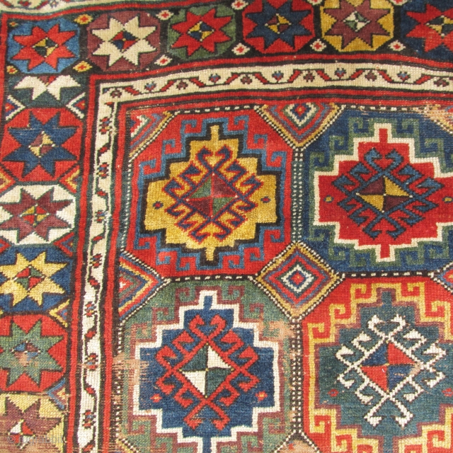 Northwest Persian Kurdish rug with a star border  and 'Memling gul'design                     