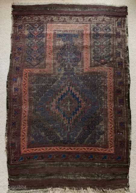 Good rug bad picture, Baluch Mushwani type prayer rug, all natural colors, (can't quite get them right in photos) lots of aubergine, blue, and slates, with corrosive brown giving a compelling sculptural ...