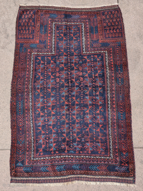 Lush blue-ground Timuri Baluch prayer rug. Great wool, vibrant natural color, super handle, very good condition with preserved flat-woven ends. Small silk highlights drawing an x x in gold. Unusual fishbone/ shrub  ...