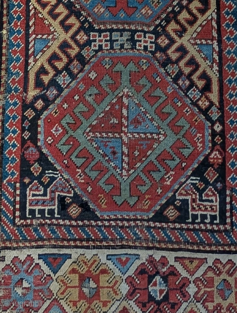 Akstafa Caucasian runner, fun thing in messed up condition with bad repair and some fuchsine dye. The other colors are vegetable dyes and quite nice. Still has some utility. Fun antique thing ...