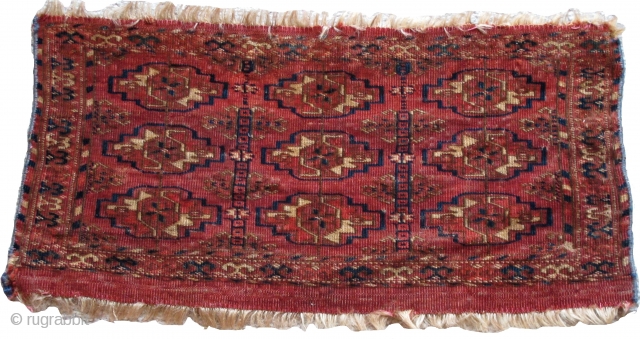 Tekke Mafrash, fine weave nine guls with linked minors containing eight-pointed stars, 2'1"x1'1"                    