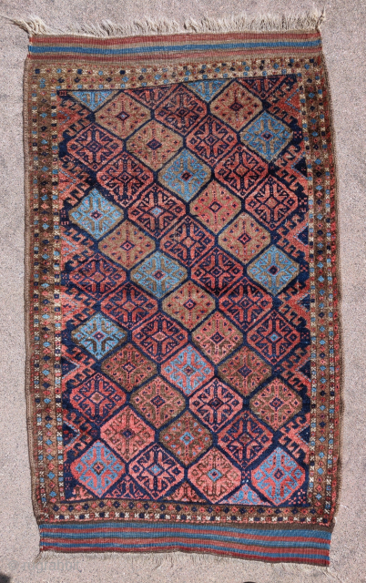 Arab Baluch rug with very glossy wool and several blues                       