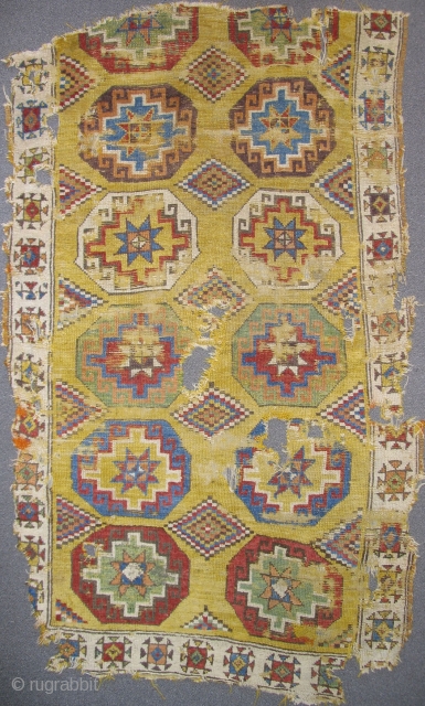 Konya Memling Gul Rug, fragmented at top. Memling guls measure about 13" square with some variations. Fantastic vibrant color including aubergine, apricot and modeled greens. Very probably 18th century, size is apx.  ...